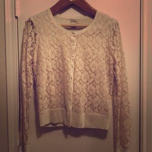 Lace cardigan style sweater.